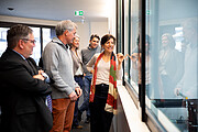 Minister Etcheverry at the window of the Large Integration Hall at ESO Headquarters