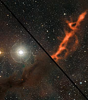 Comparación, al pasar el cursor sobre  la imagen, del filamento de formación  estelar en Tauro visto en el rango  milimétrico y en luz visible