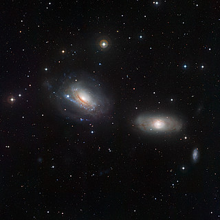 The disturbed galactic duo NGC 3169 and NGC 3166