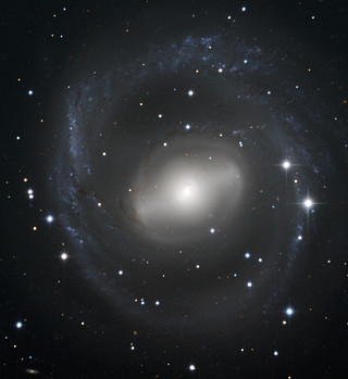 Barred Spiral Galaxy Swirls in the Night Sky