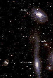 The hooked galaxy and its companion - annotated image