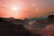 En konstnärs intryck av solnedgång på super-jorden Gliese 667 Cc