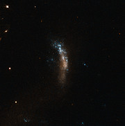 Trpasličí galaxie UGC 5189A, místo exploze supernovy SN 2010jl