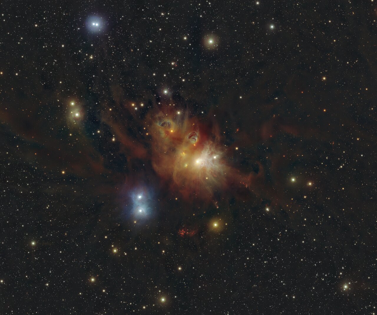 An infrared view of the region around the Coronet star cluster