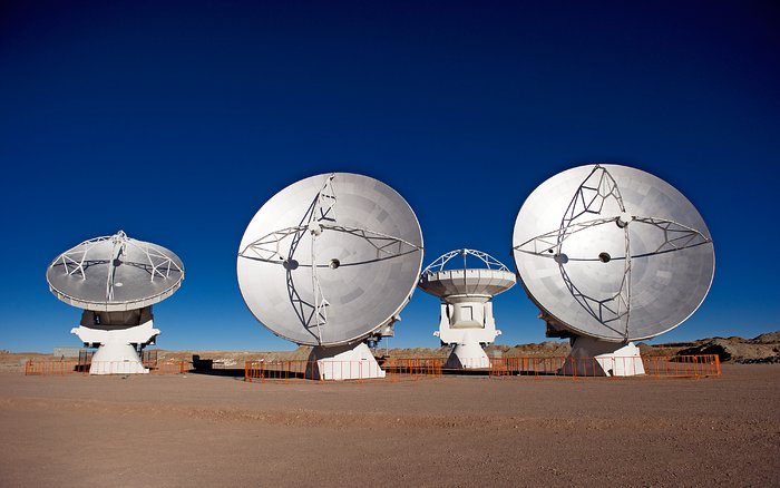 Four ALMA antennas on the Chajnantor plain