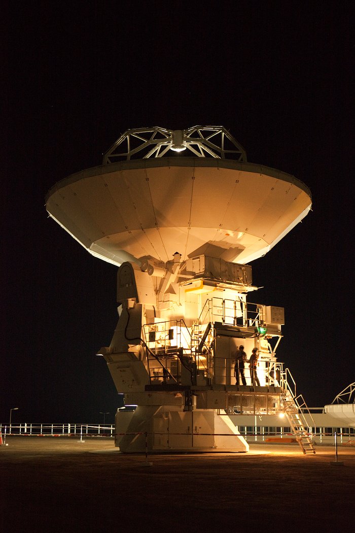 ALMA antennas and OSF at sunset