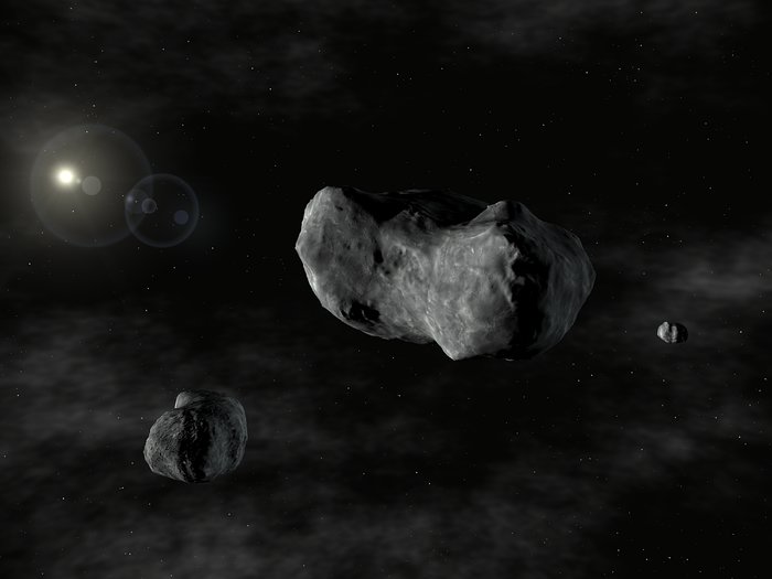 Artist's impression of the triple asteroid system, 87 Sylvia