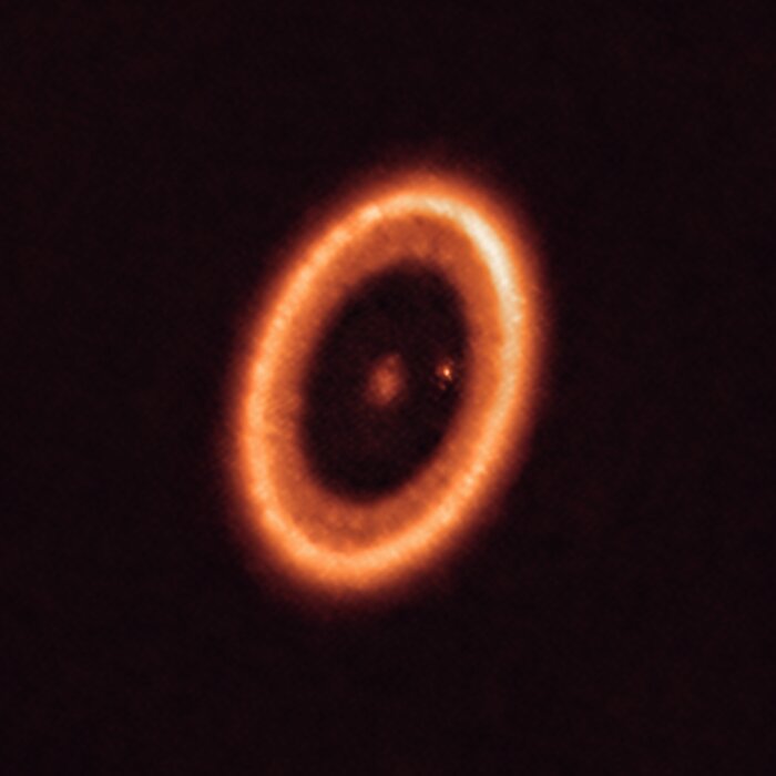 O sistema PDS 70 observado pelo ALMA