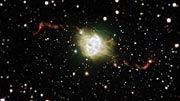 Zooma in mot den planetariska nebulosan Fleming 1