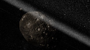 Artist’s impression van het ringenstelsel rond planetoïde Chariklo