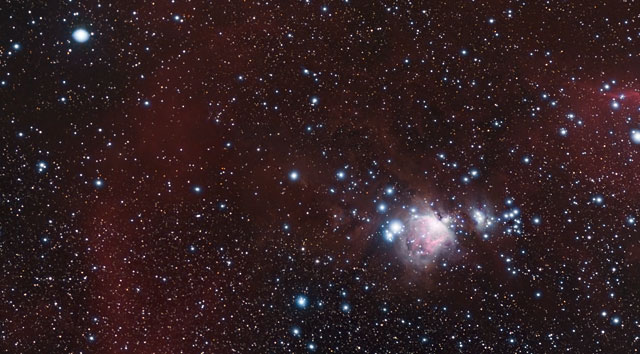 Zoomaten APEX-teleskoopin kuvaan osasta Orionin sumua