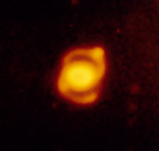 Ring-shaped nebula around SN 1987A