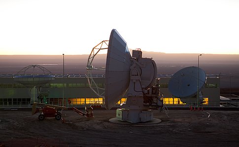 ALMA antennas and OSF at sunset