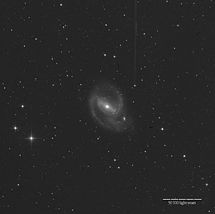 The Barred Spiral Galaxy NGC 1097
