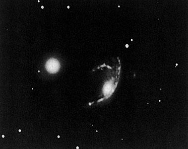 The peculiar galaxy ESO 060-IG26
