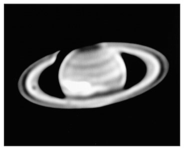 Saturn and the Giant White Spot