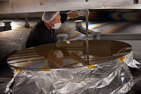 Recoating process in the vacuum chamber