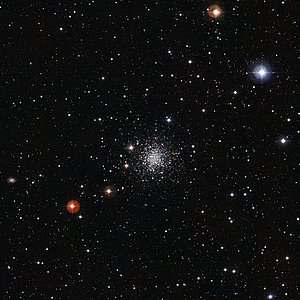 An Ancient Cluster of Stars Against a Stunning Background