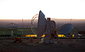 ALMA antennas and OSF at sunset