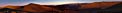 Panoramic view of the desert around the Paranal Observatory at sunset.