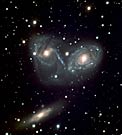 Cosmic Ballet or Devil's Mask - Galaxy Triplet NGC 6769-71 (VLT MELIPAL + VIMOS)