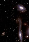 The Hooked Galaxy and its Companion