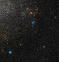 Wide-field view of part of the Large Magellanic Cloud and the remarkable double star OGLE-LMC-CEP0227