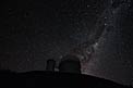 The Milky Way and Alpha and Beta Centauri behind the 3.6-metre telescope at La Silla