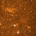 Stars and Nebulae in Dwarf Galaxy NGC 6822