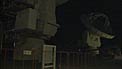 An ALMA Antenna Moves in the Night