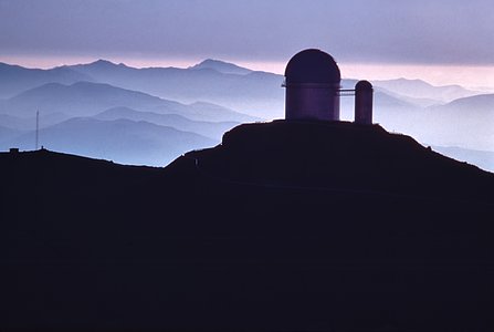 Aerial close up view of the ESO 3.6-metre telescope with the 1.4-m Coudé Auxiliary Telescope