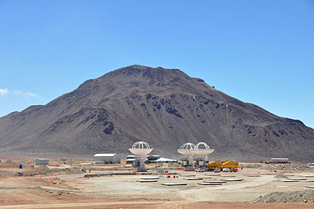 Three ALMA antennas close together on Chajnantor