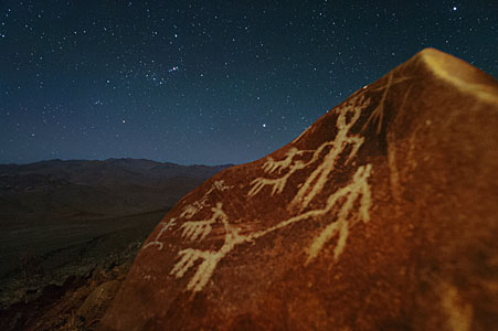 Orion raising over petroglyphs