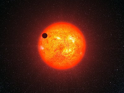 Artist’s impression of GJ 1214b in transit
