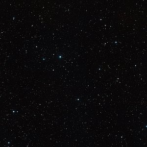 Wide-field view of the sky around the brown dwarf binary CFBDSIR 1458+10