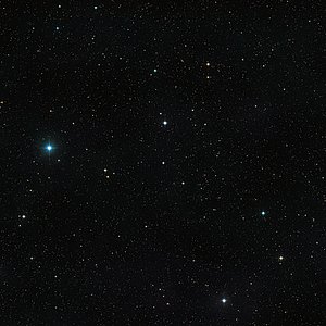 Wide-field view of the sky around the unusual binary star V471 Tauri