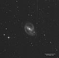 The Barred Spiral Galaxy NGC 1097