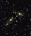 Cluster of galaxies CL0053-37 in NGC 300 field