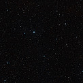 Wide-field view of the sky around the brown dwarf binary CFBDSIR 1458+10