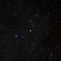 Wide-field view of the sky around the Meathook Galaxy