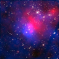 X-rays, dark matter and galaxies in the cluster Abell 2744