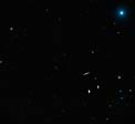 Wide-field view of the sky around the Leo Triplet of galaxies