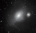 To helt forskjellige naboer: galaksene NGC 1316 og NGC 1317