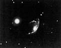The peculiar galaxy ESO 060-IG26