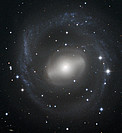 Barred Spiral Galaxy Swirls in the Night Sky