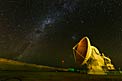 ALMA antenna at night.