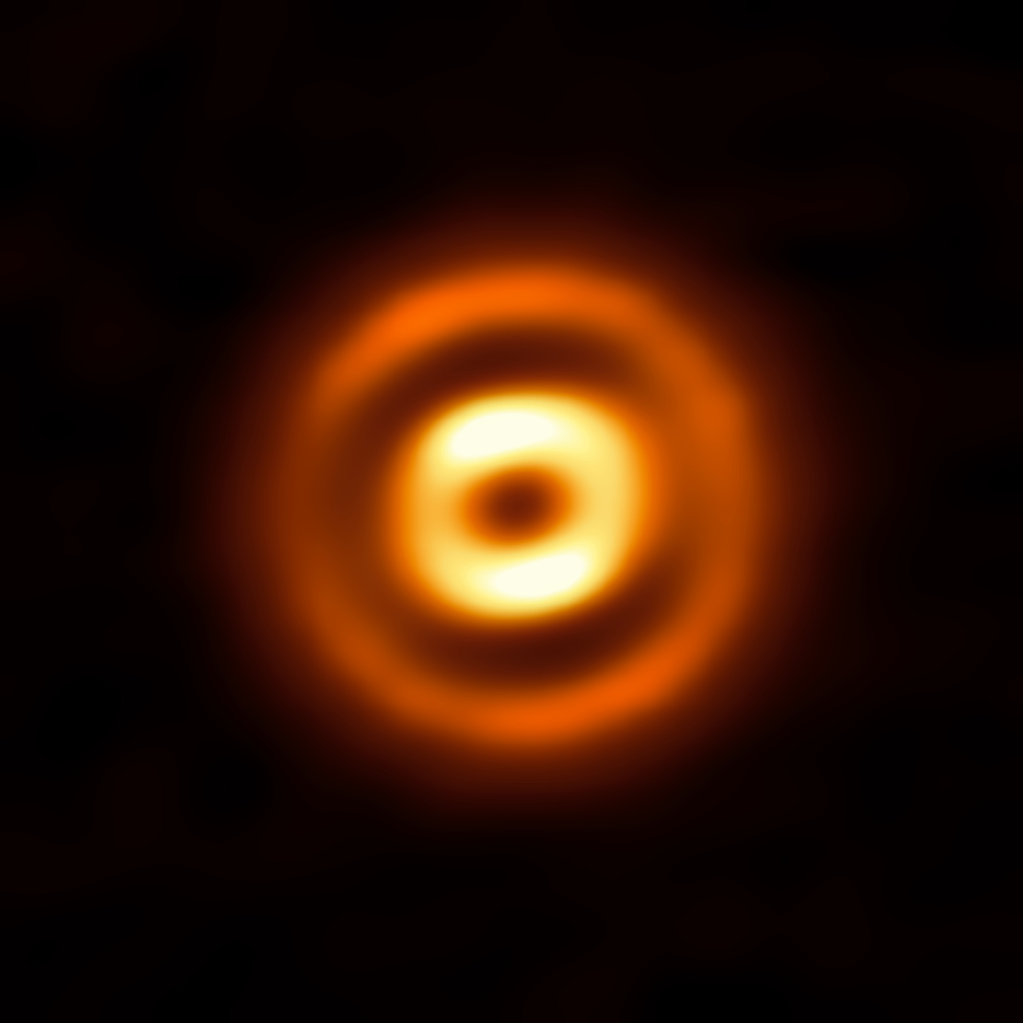 Spring Cleaning in an Infant Star System | ESO