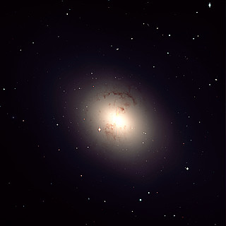 Giant elliptical galaxy NGC 1316 in Fornax Cluster | ESO