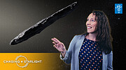 The image shows the host of the Chasing Starlight show, Suzanna Randall, on the right hand side in front of a starry background. She is looking over to her right and pointing with her hand at a long, thin interstellar object, ʻOumuamua’. In the bottom left of the image are the words “Chasing Starlight” on a yellow/orange background. In the top right corner, the blue and white ESO logo is shown.