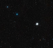 The region around SMM J2135-0102 and the galaxy cluster MACS J2135-010217